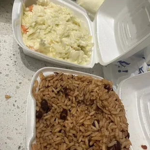 Coleslaw and rice and peas