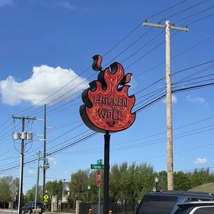 Chicken and the Wolf road sign
