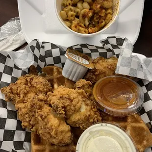 Chicken and waffles with side of Mac and cheese. Sauce: ranch and mango Habanero.
