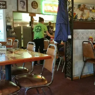 a woman standing in a restaurant