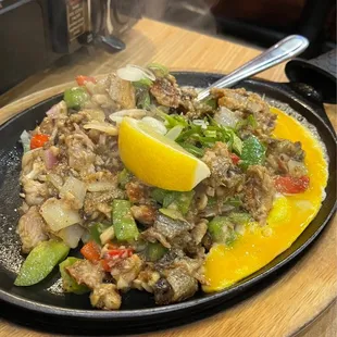 Sizzling milk fish with egg