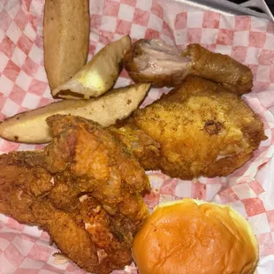 3 pieces chicken and you had the choice of 2 sides. I chose mac salad and potatoes wedges.