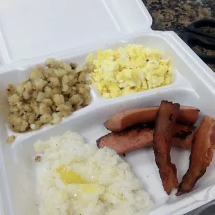 a meal in a styrofoam container