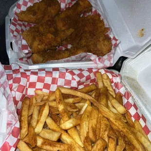 We got 8 chicken tenders with spicy Cajun and large fries with spicy Cajun