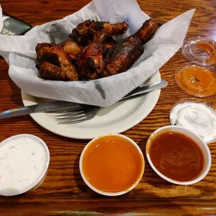 6 charbroiled Chicken wings with ranch, hot buffalo and a spicy barbecue sauce.