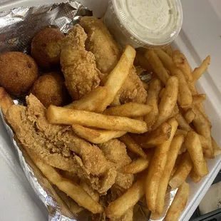 Perch plate with fries, cole slaw, and hush puppies