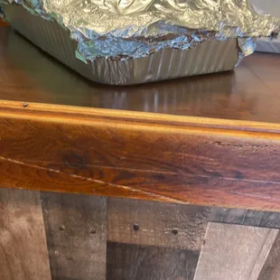 a foil pan on a counter