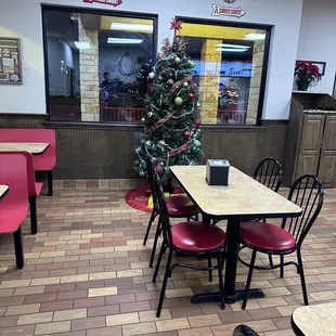 a christmas tree in the window