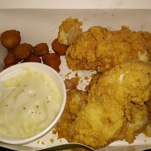 Huge, fresh and flavorful chicken strip dinner with mashed potatoes and fried okra!