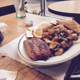 Yummy breakfast with tea...links and roasted potatoes