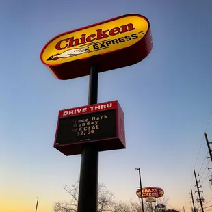 a sign for a drive thru restaurant