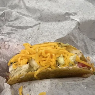 Chicken taco with &quot;extra&quot; cheese