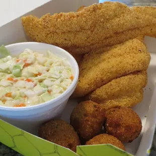 Fish fillets, hushpuppies, cole slaw