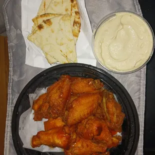 Dinner Fried Buffalo wings  Pita bread  Hummus