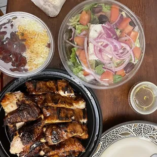 Chicken/rib combo, rice and beans, Greek Salad, and Pita bread. All delicious beyond belief!