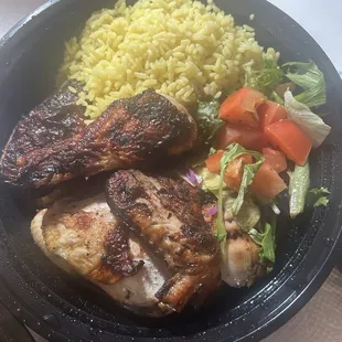 1/2 chicken meal with yellow rice and salad