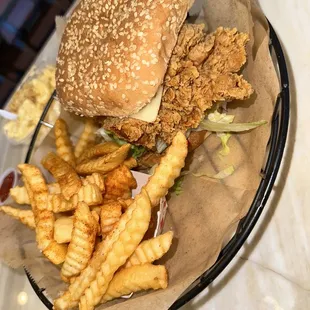 a basket of fries and a sandwich