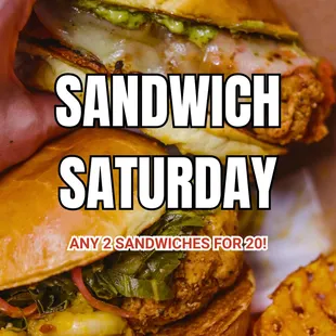 a hand holding a sandwich