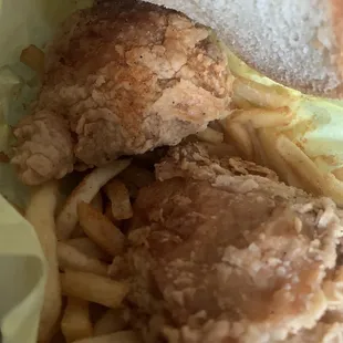 Two thigh basket (pickles, jalapeno, bread, fries, chicken thighs)