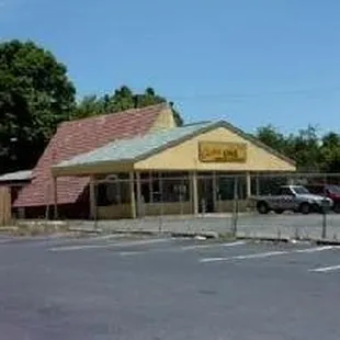 a parking lot with cars parked in it
