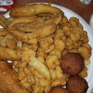 a plate of fried food on a table