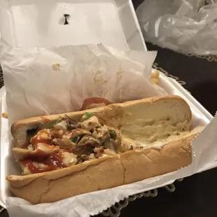 a sandwich in a styrofoam container