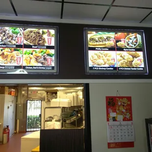 menus on the wall of the restaurant
