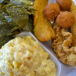 Salt and pepper catfish with 2 sides for $7.95. The hush puppies were not good, mac &amp; cheese was so-so but fish and greens were good.