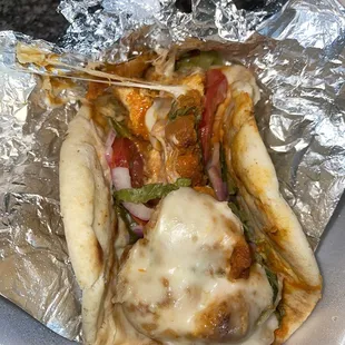 #10 Buffalo Chicken Pita (cheese pull) | Instagram @Kurlykonnoisseur