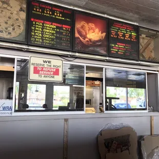 menus on the wall of the restaurant