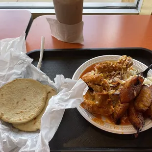 a plate of food on a tray