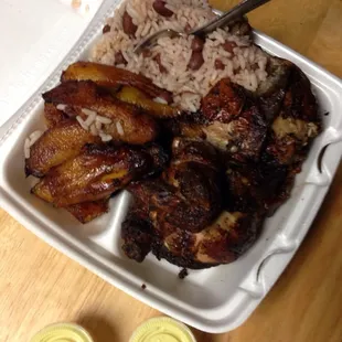 1/2 chicken, plantains and rice &amp; beans.
