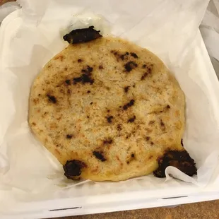 Pupusas the size of the to-go container.