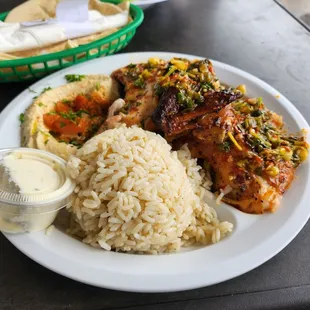 Spicy garlic 1/2 chicken combo  with hummus and rice