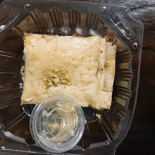 Maison-Made Baklava: Fillo dough, crushed walnuts, topped with honey, and sprinkled with pistachios.