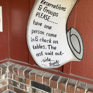 a sign on the side of a building