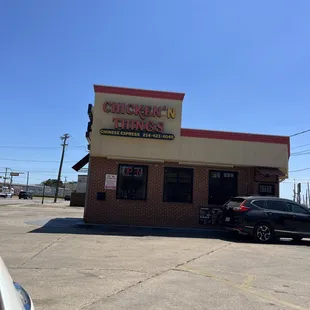 a car parked in front of a restaurant