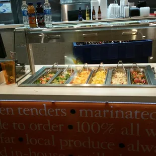 a buffet with many different types of food