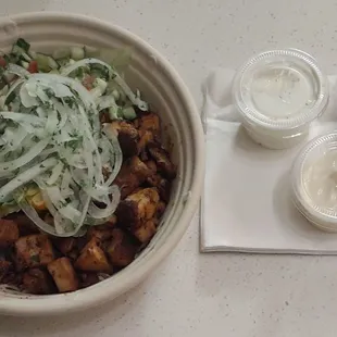 Chicken Rice Bowl with garlic, hot, and tzatziki sauces