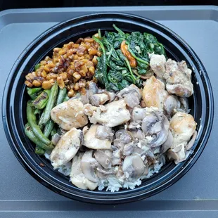 a bowl of food on a tray