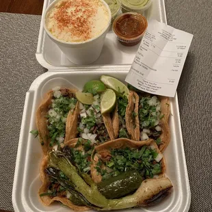 elotes, steak &amp; al pastor tacos