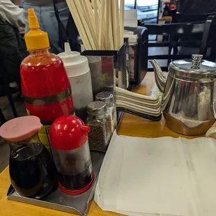 Condiments and utensils provided at the table