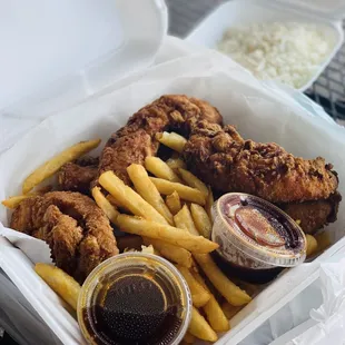 Chicken Tenders with Fries and a side of rice