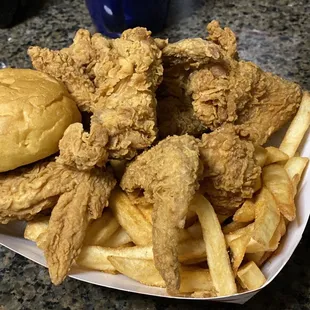 Wing dinner, fries and a roll.