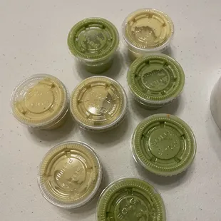 Yellow sauce is creamy. Green sauce is spicy. Both are delicious