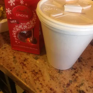 Small coffee and holiday chocolates