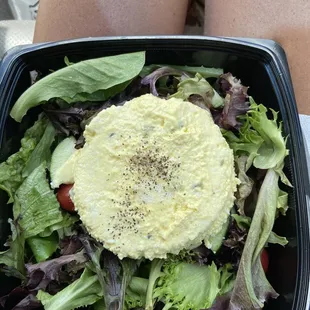 Salad with a scoop