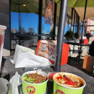 two bowls of food on a table