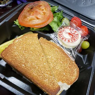 An original chicken salad sandwich w/fresh fruit.  Didn&apos;t realize I&apos;d get a cookie too!