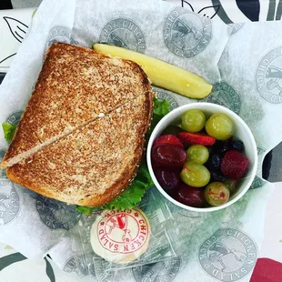 Chicken Salad Sandwich on Toasted Wheat Bread with Fruit Cup, Pickle Spear and Cookie